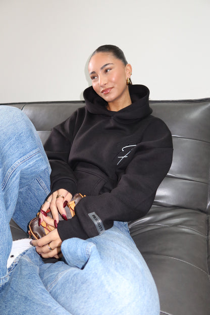 Kapuzenpullover mit Priority-Signatur